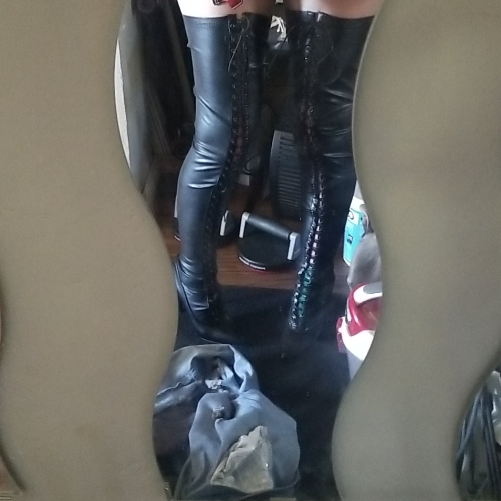 Thigh high black boots